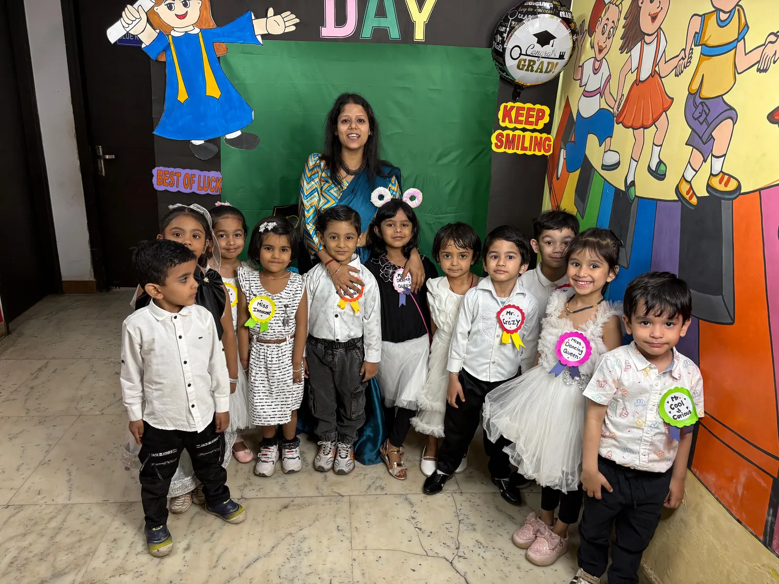 Annual day celebration at Buzzy Bees nursery school in Patel Nagar, children with award ribbons